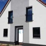Fußbodentiefe Fenster in Anthrazit mit Absturzsicherungen